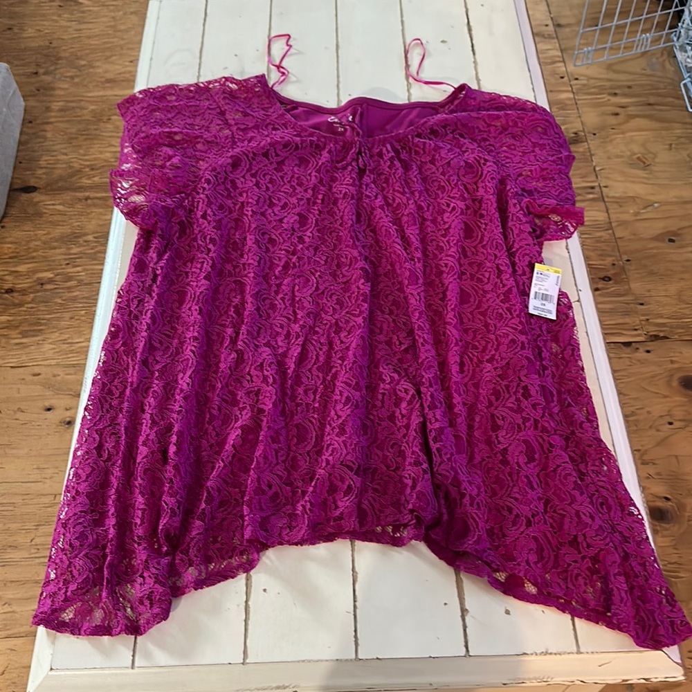 New woman’s pink lace overlay shark-bite top size 2x